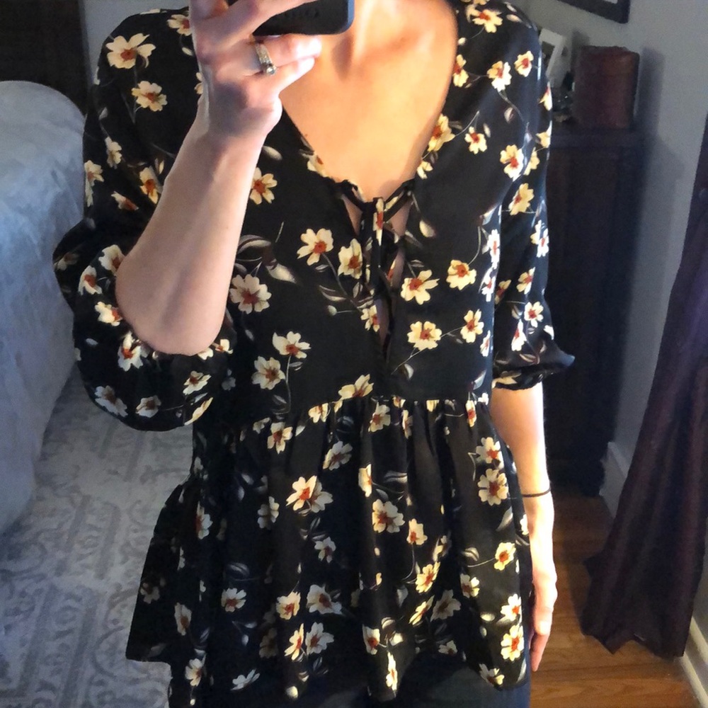 Black Floral Low Cut Lace-Up Peplum Top
